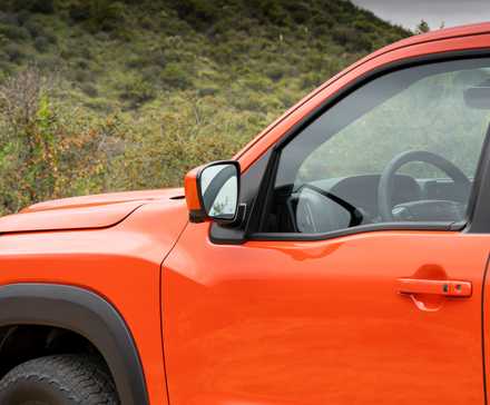 Close lateral da parte frontal do Nissan Frontier Pro-4X 2026