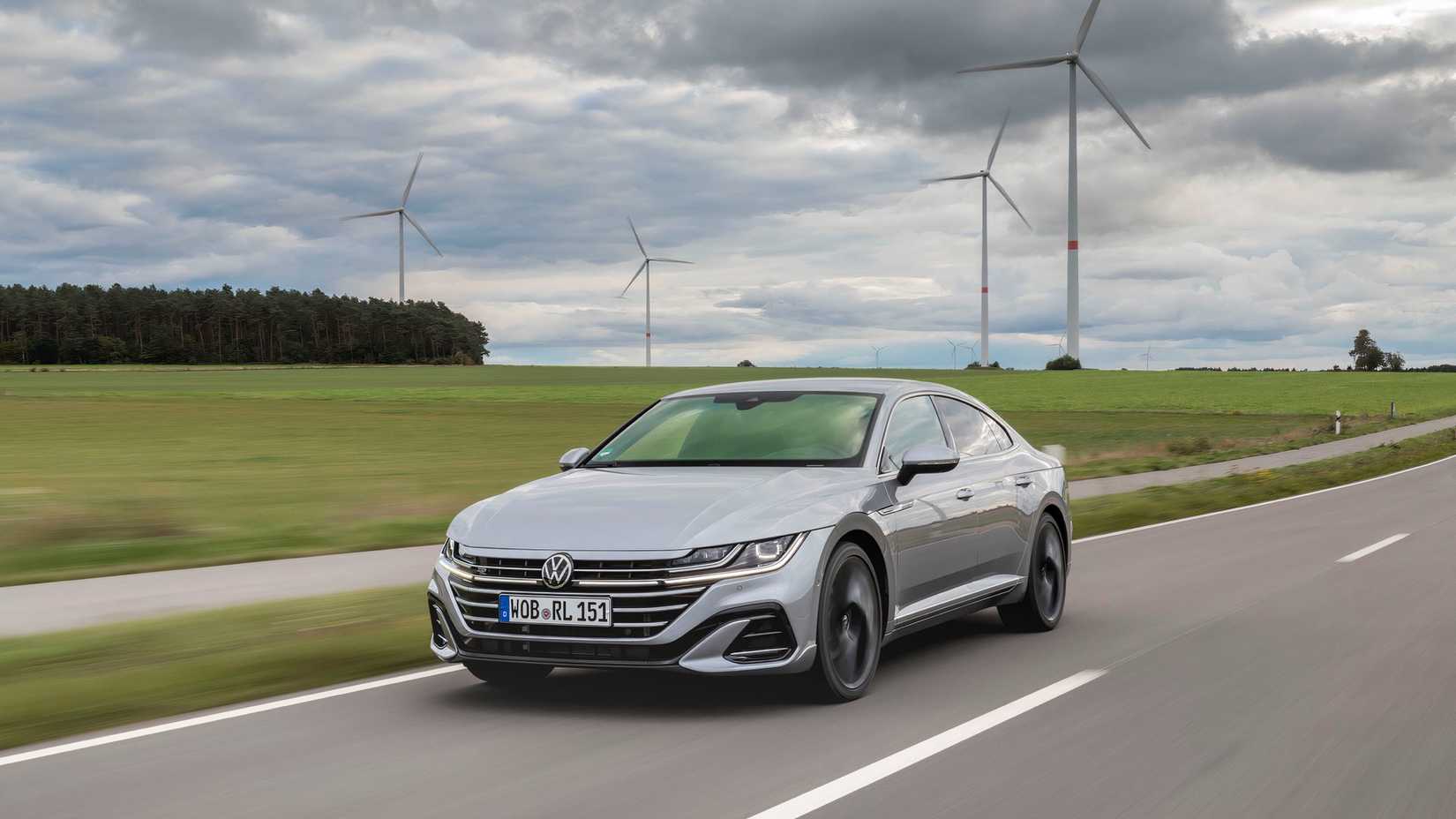 Silver Volkswagen Arteon driving on country road