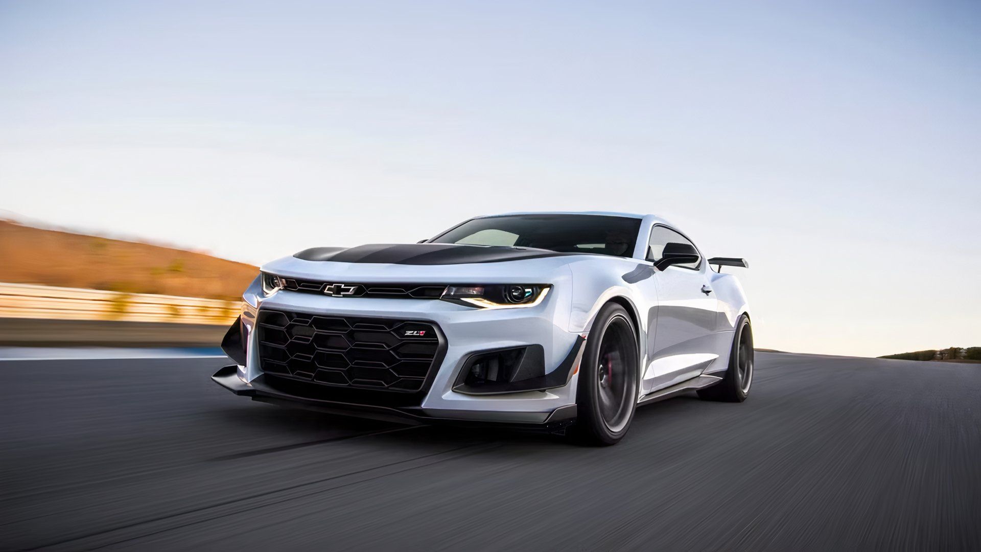 2024 Chevrolet Camaro ZL1 in white driving on track