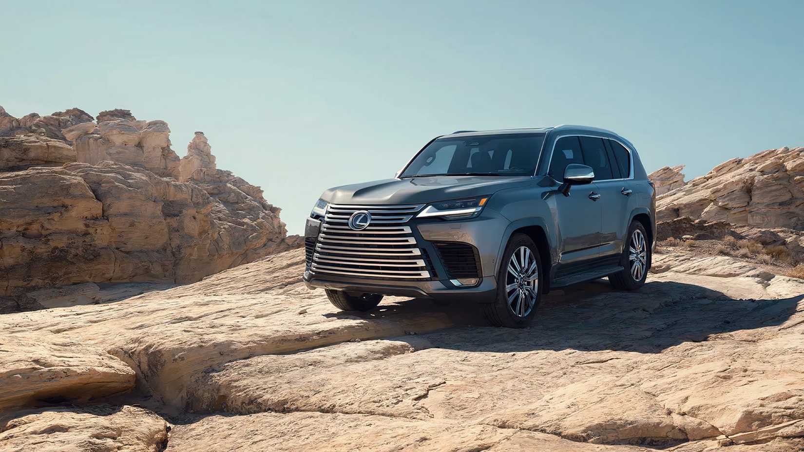 2025 Lexus LX 600 in Atomic Silver parked on rock