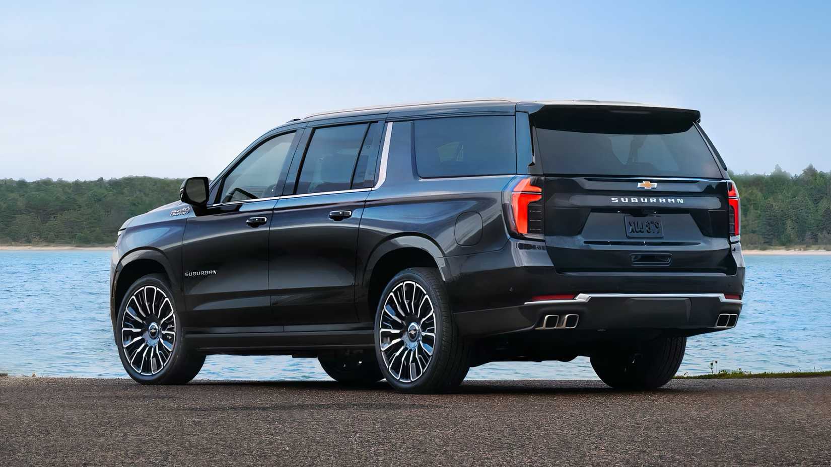 2025 Chevrolet Suburban in blue parked in front of lake