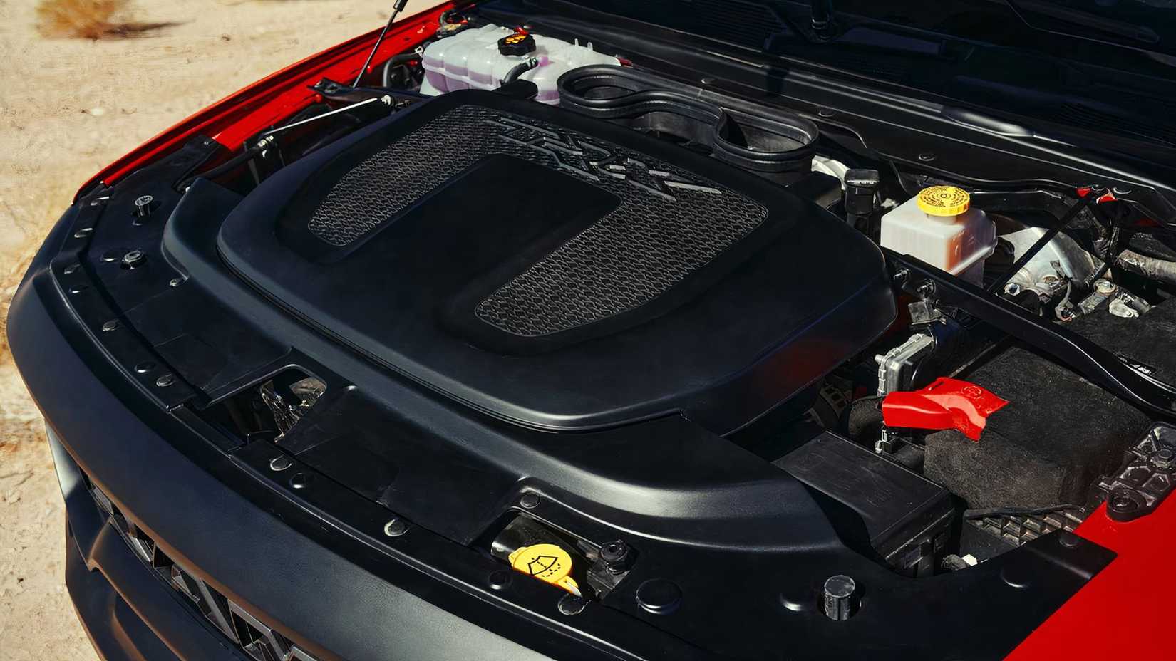 Close-up shot of 2024 Ram 1500 TRX engine bay showing 6.2-liter supercharged HEMI V8