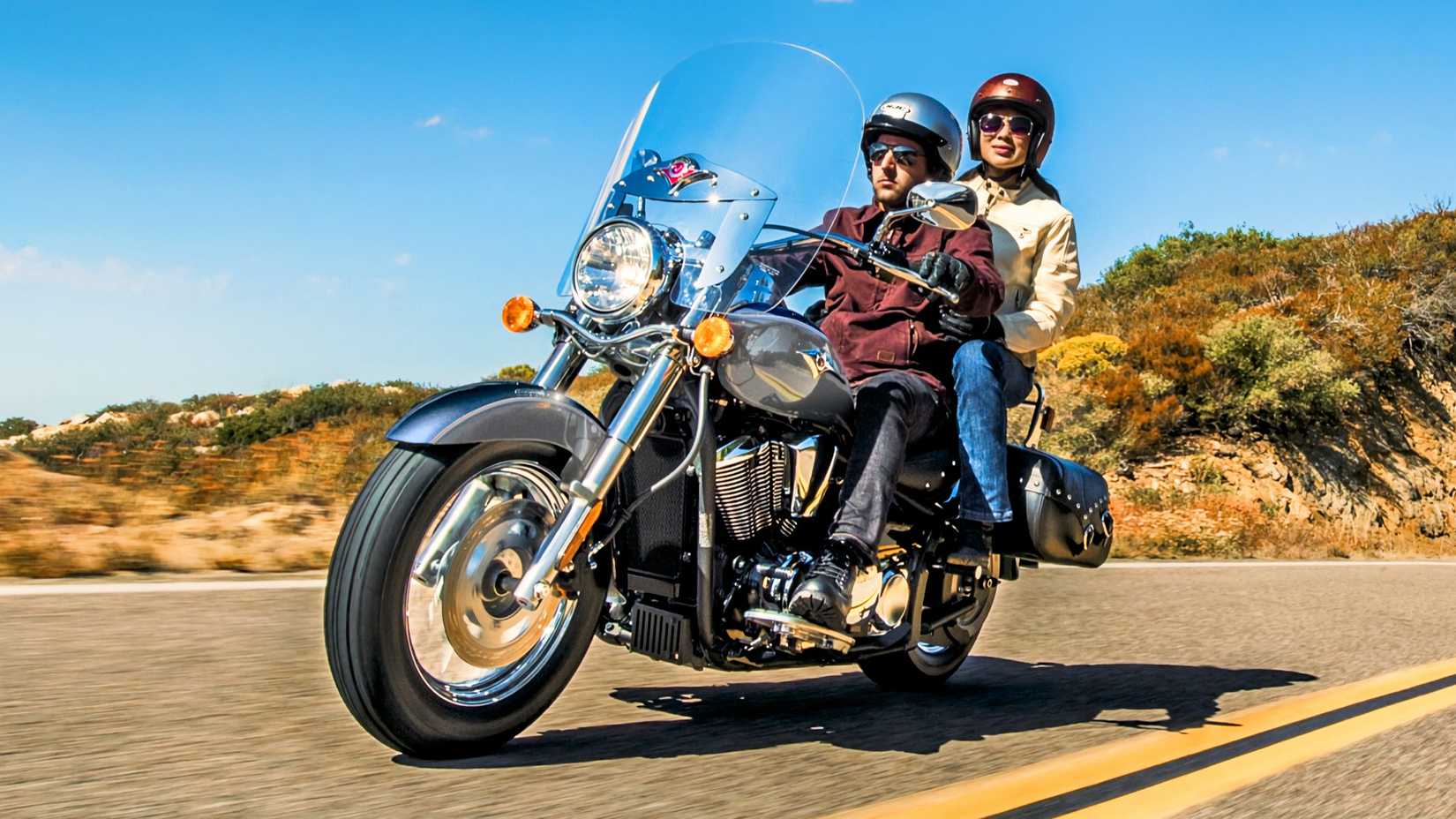 Rider and passenger on a 2025 Kawasaki Vulcan 900 Classic LT