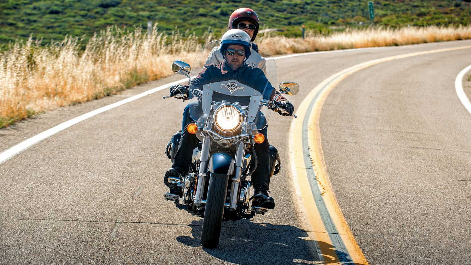Rider and passenger on a 2025 Kawasaki Vulcan 900 Classic LT