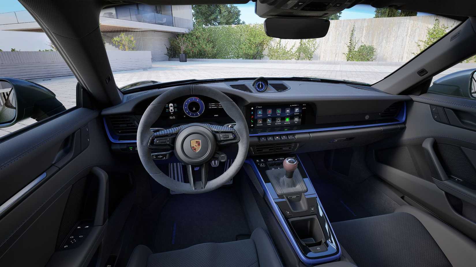 Vista interna do lado do motorista de um Porsche 911 Carrera T