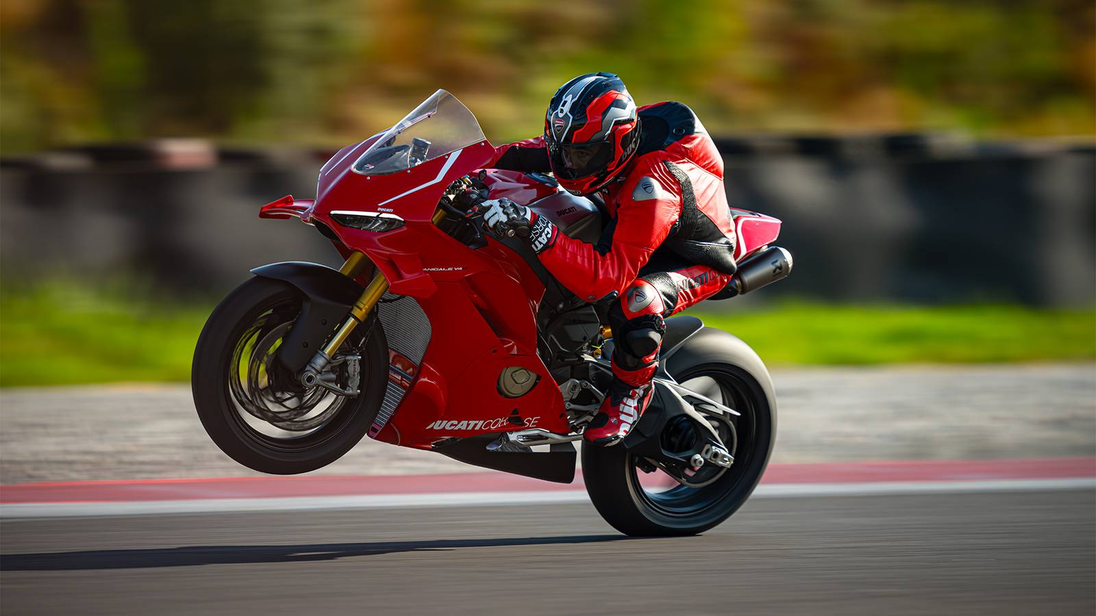 2026 Ducati Panigale V4 R popping a wheelie on a racetrack