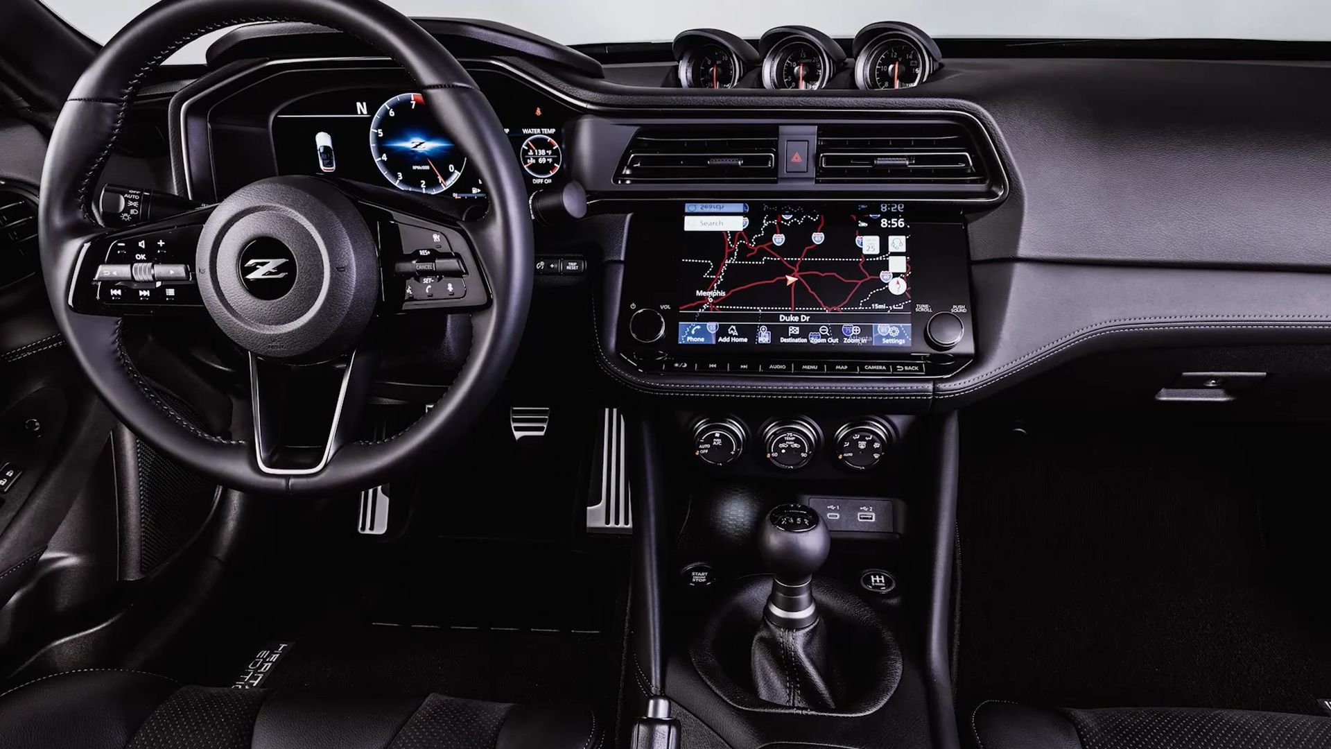 Triple dash-top analog gauges show boost pressure, turbine speed, and battery voltage