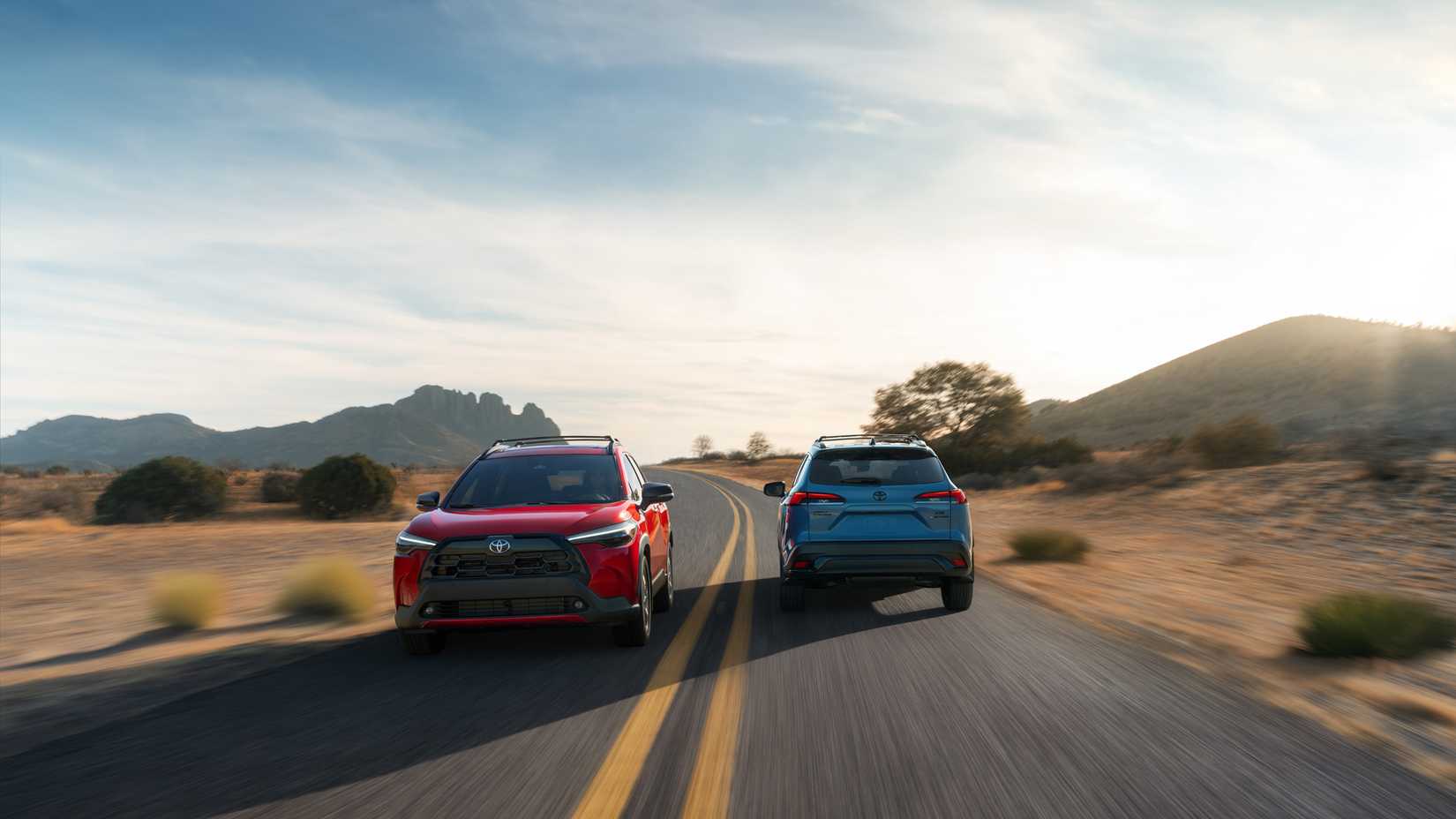 2026 Toyota Corolla Cross, two examples, profile of front and one rear side by side