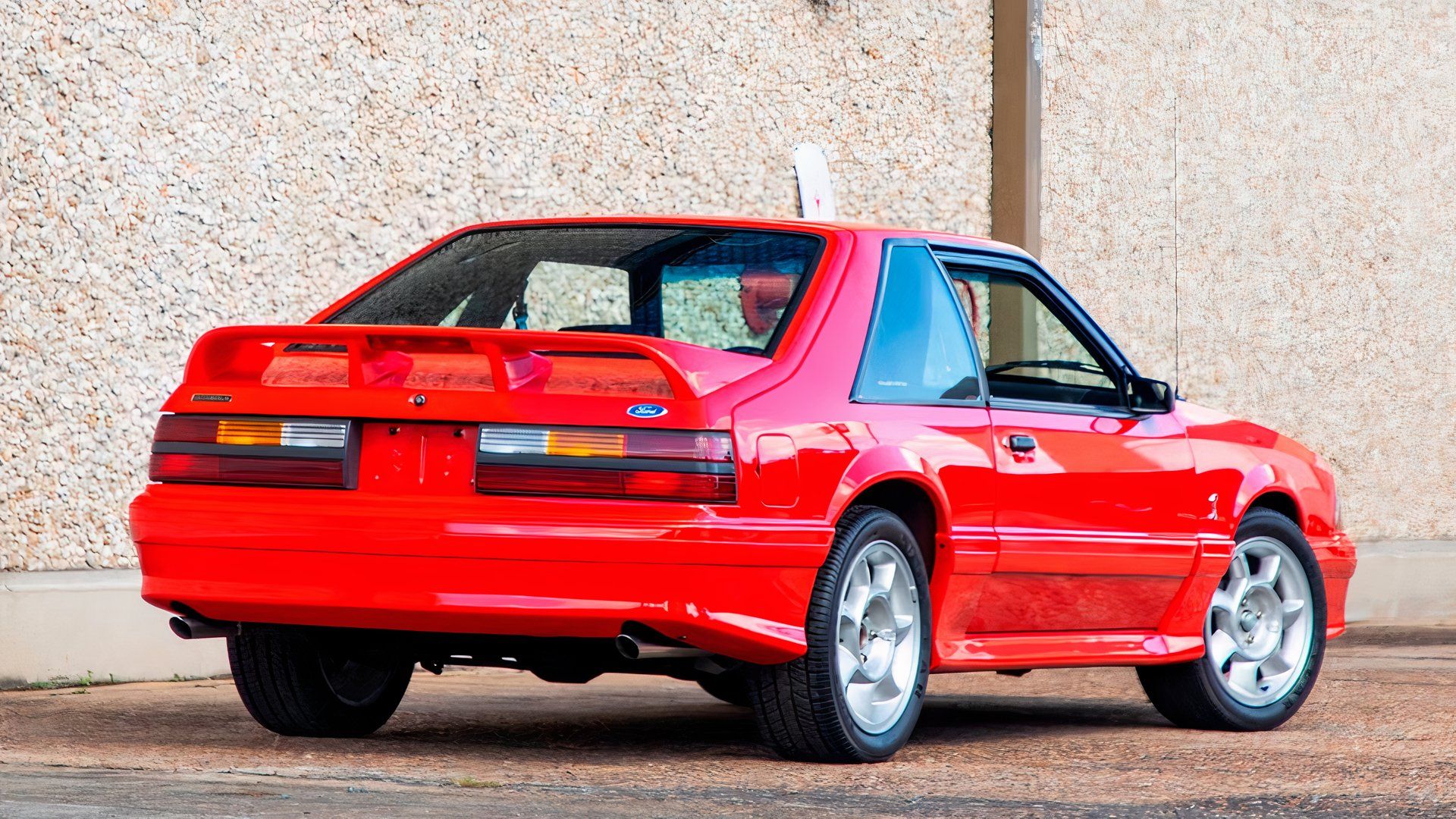 Rear 3/4 shot of 1993 Ford SVT Mustang Cobra R in red