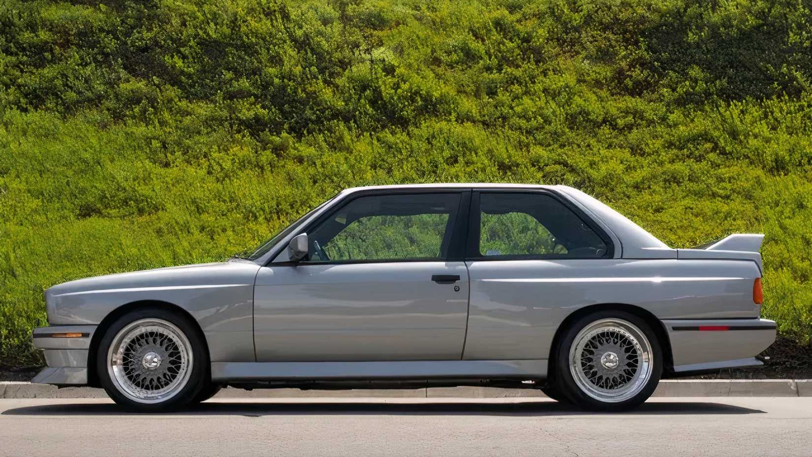 1988 BMW M3 in silver parked in parking lot