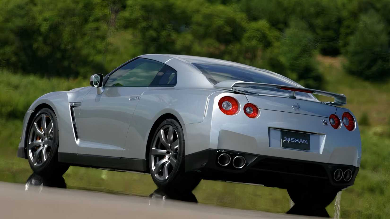 2010 Nissan GT-R in silver parked on road