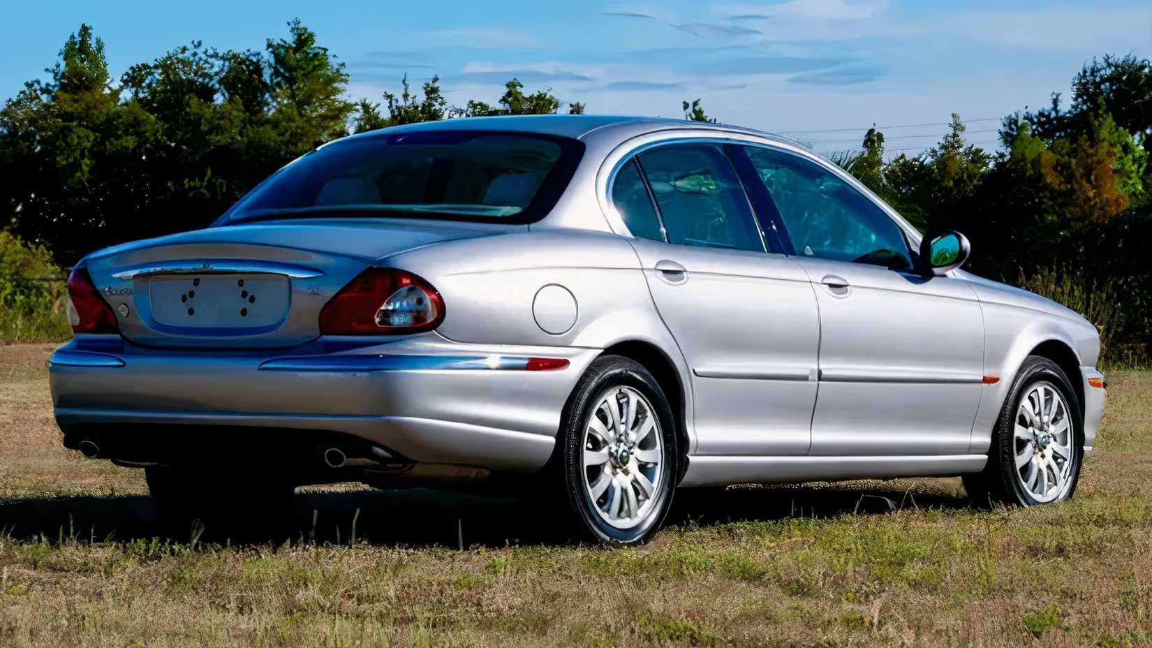 2002 Jaguar X-Type in silver parked on grass