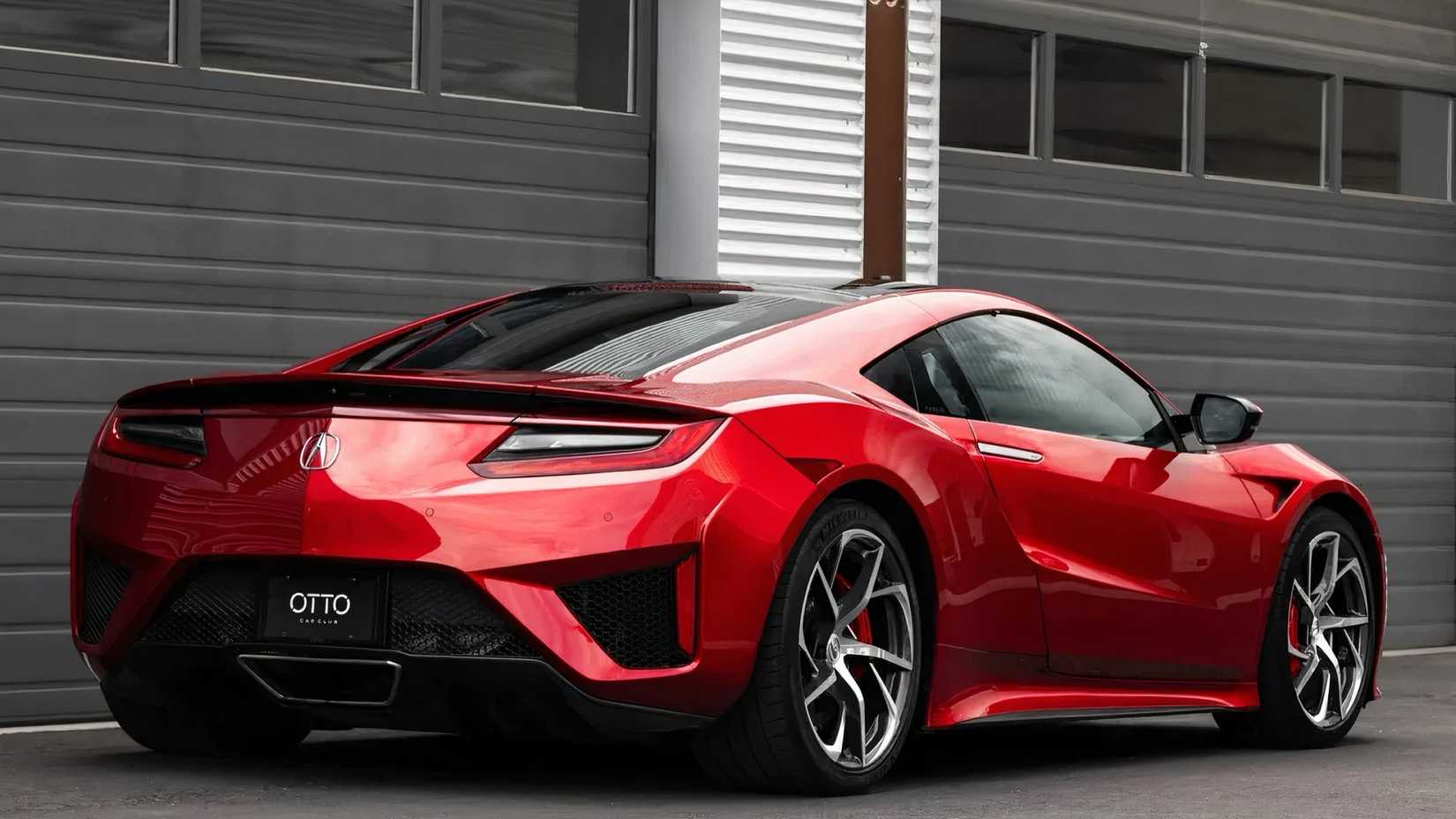 2017 Acura NSX em vermelho estacionado do lado de fora
