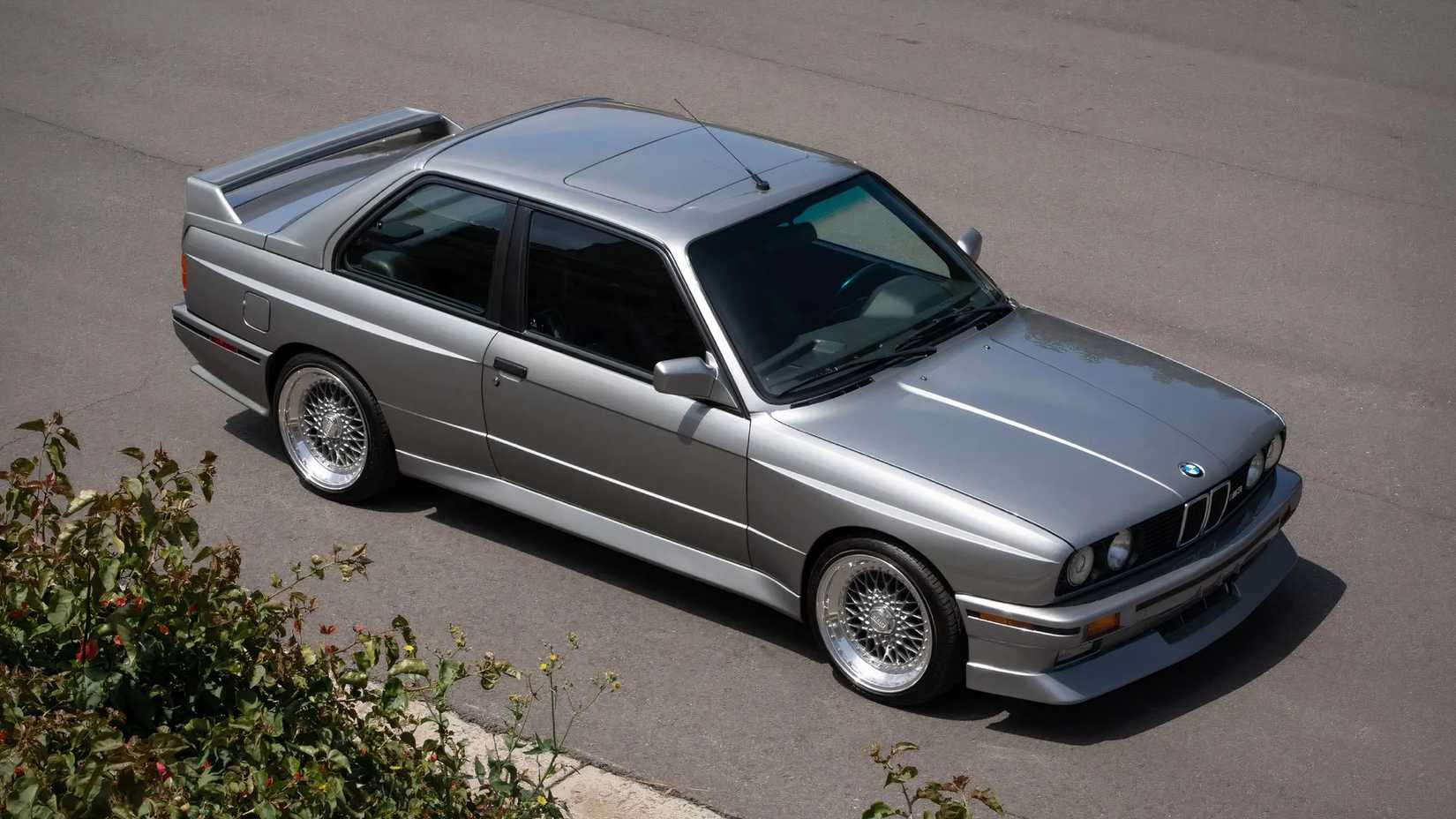 1988 BMW M3 in silver parked on road