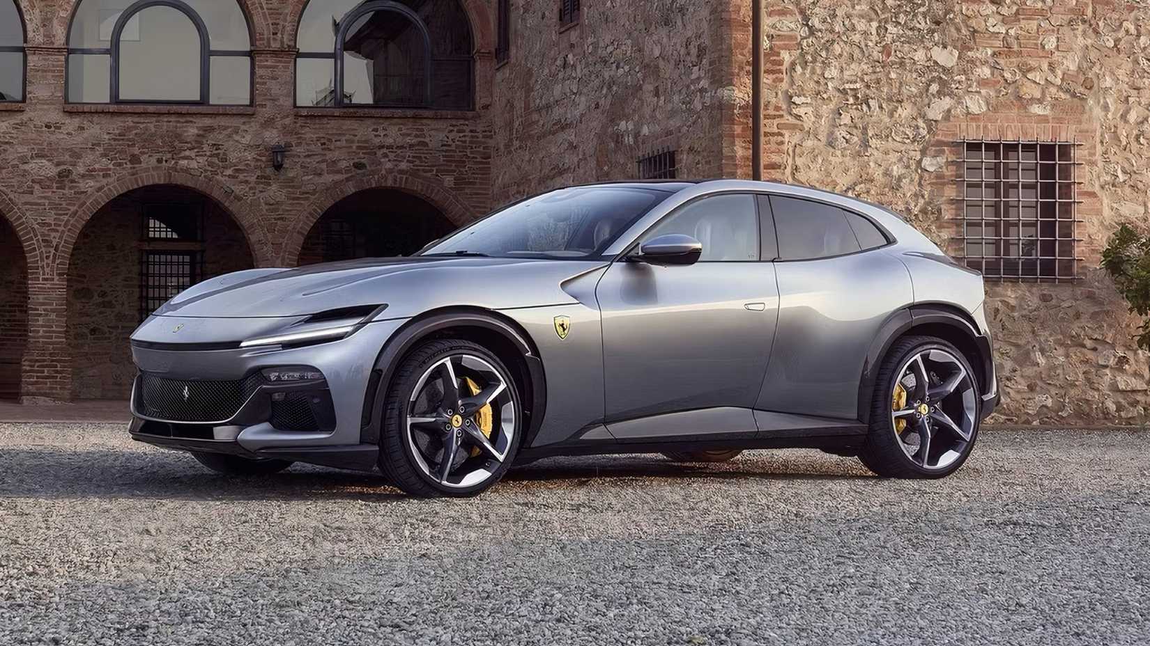 Front 3/4 shot of a 2025 Ferrari Purosangue in silver parked