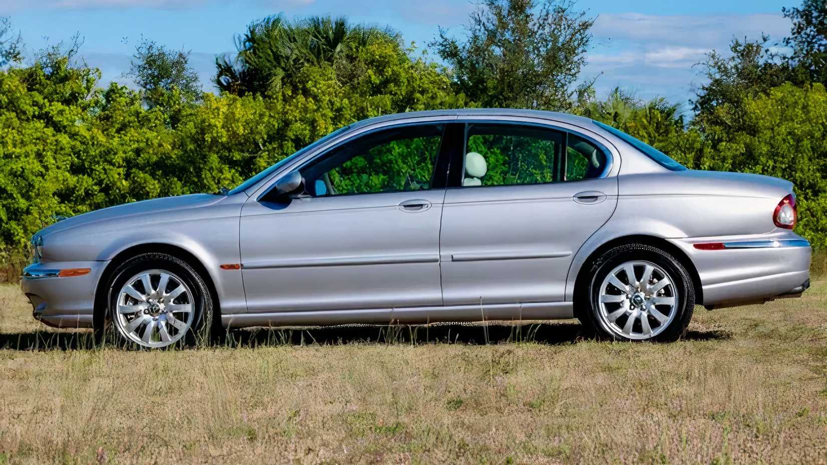 2002 Jaguar X-Type in silver parked on grass
