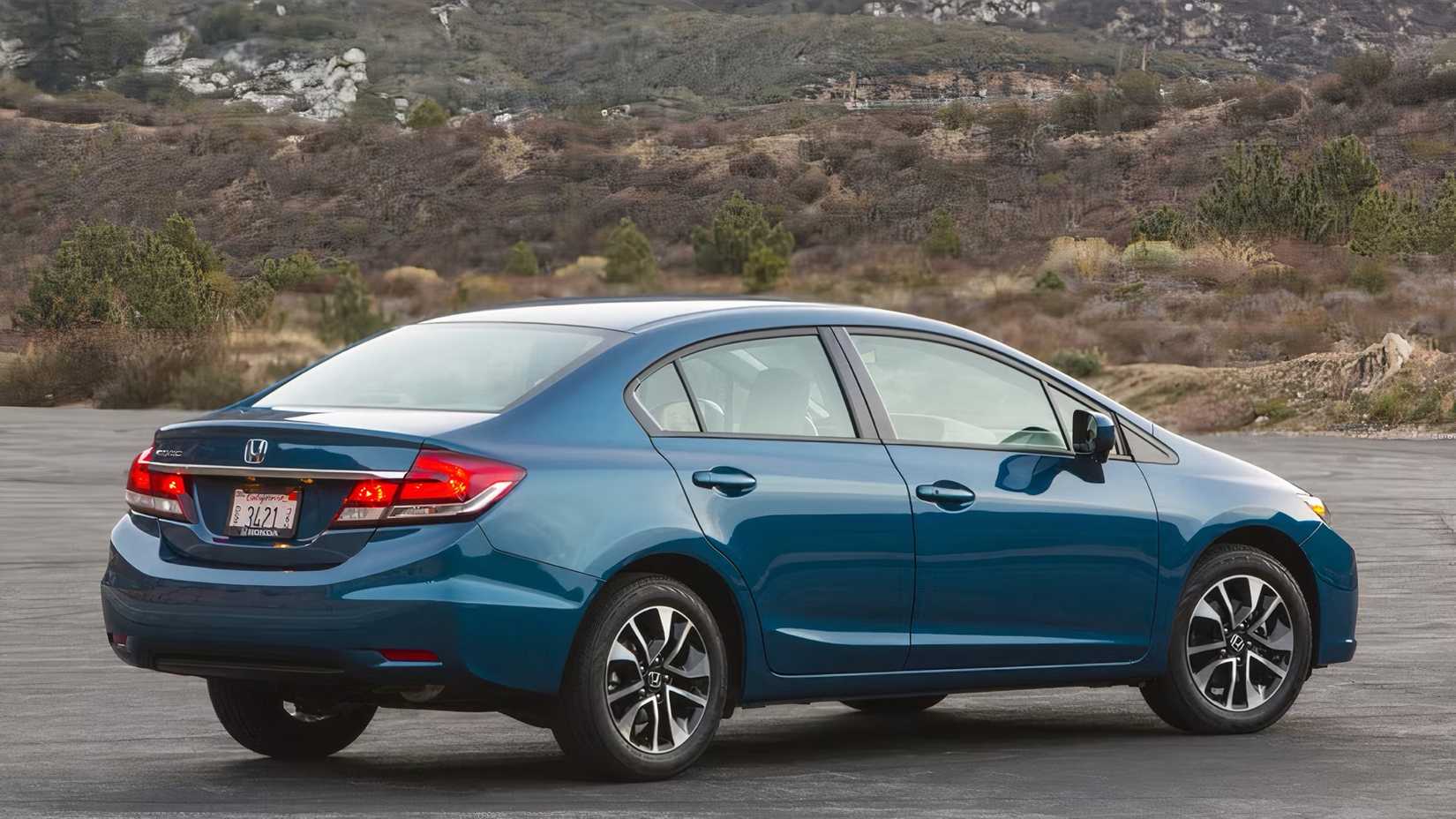 2015 Honda Civic in blue parked