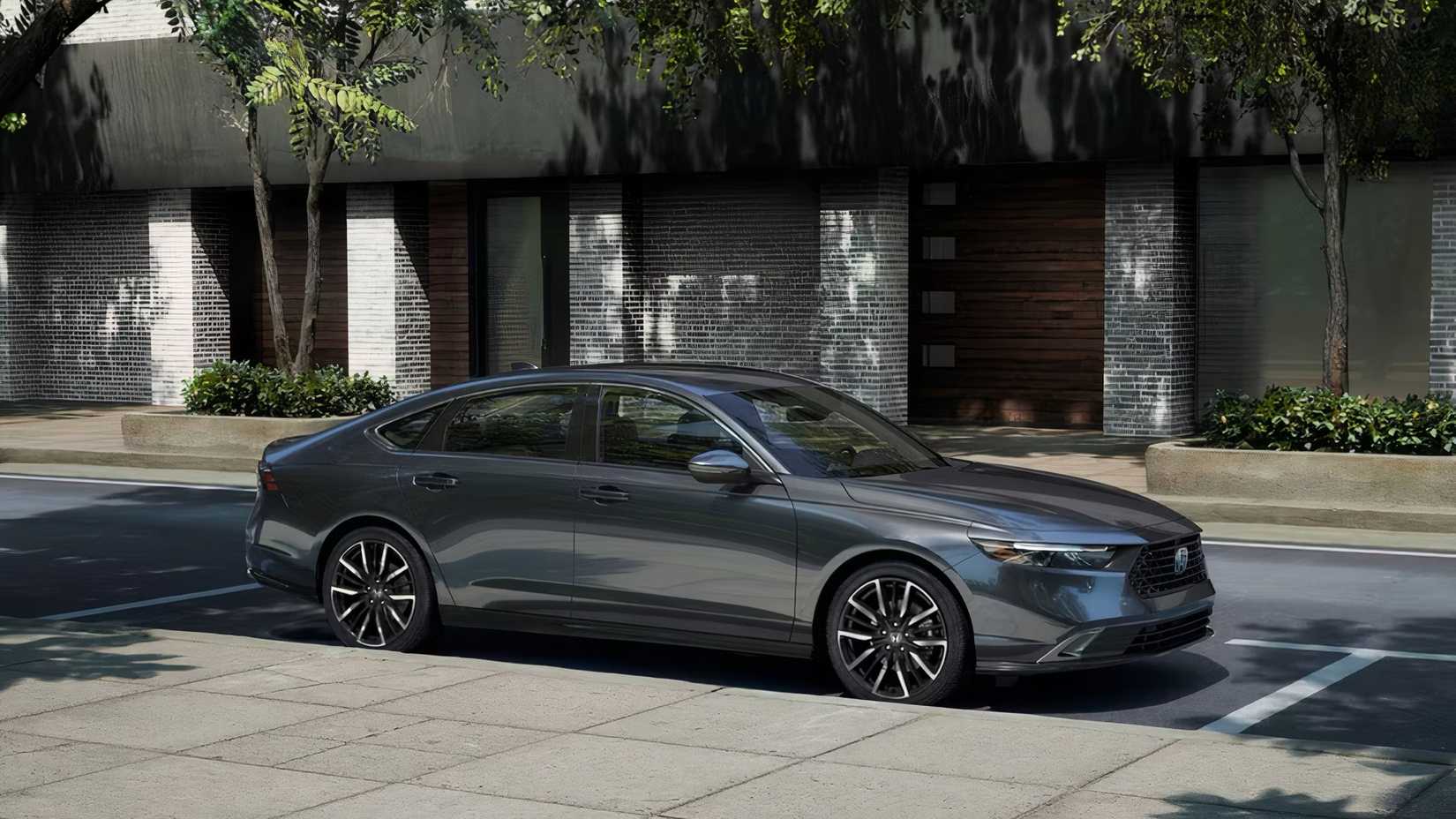 2025 Honda Accord in silver parked on city street