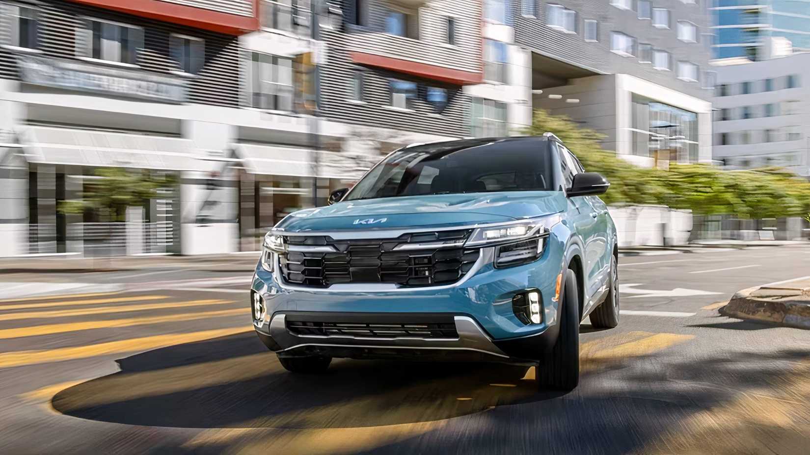 2025 Kia Seltos in blue being driven on road