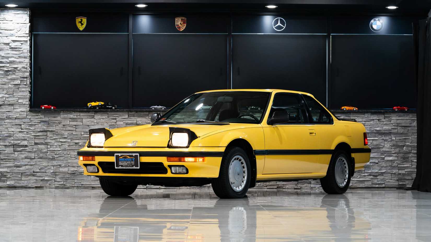  1989 Honda Prelude Si in yellow parked