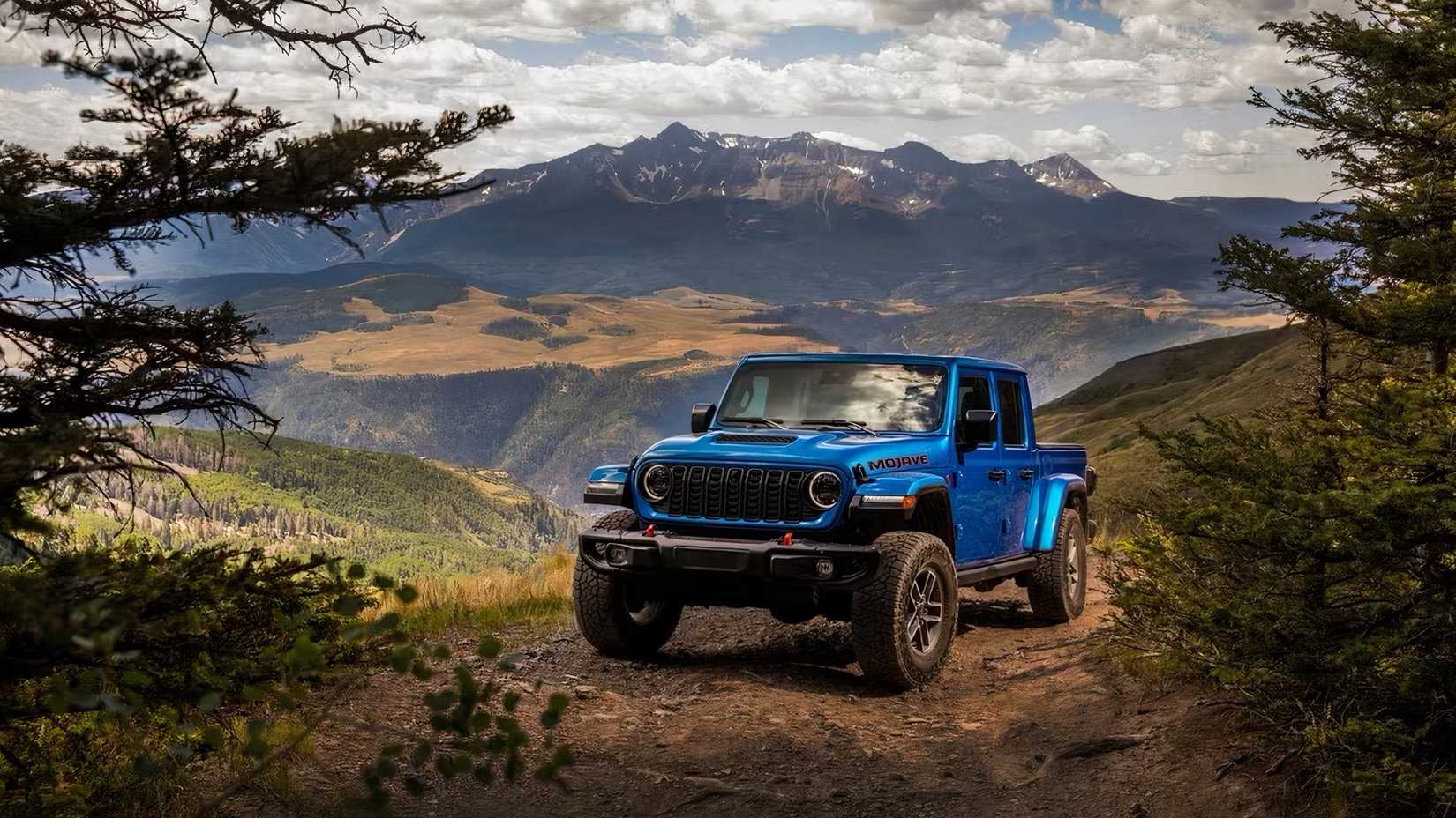 2025 Jeep Gladiator in blue parked off-road