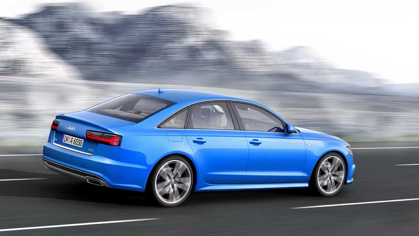 2010 Audi A6 in blue being driven on road