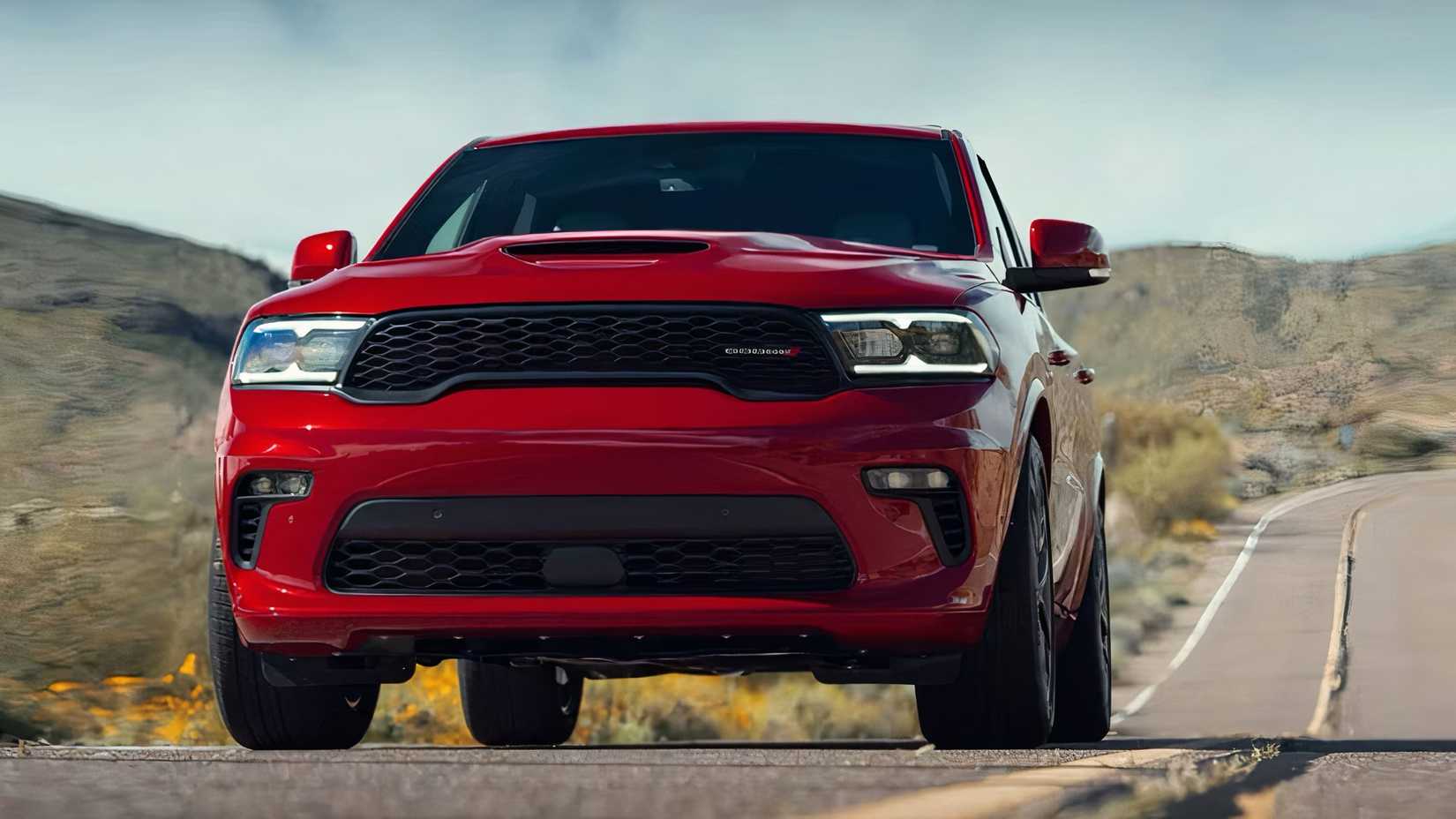 2025 Dodge Durango in red being driven on road