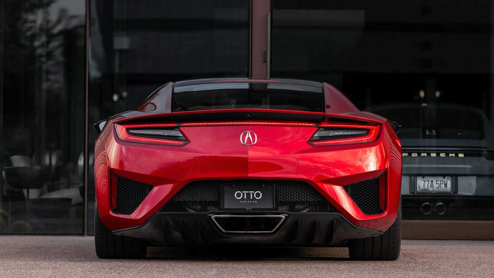 2017 Acura NSX em vermelho estacionado do lado de fora