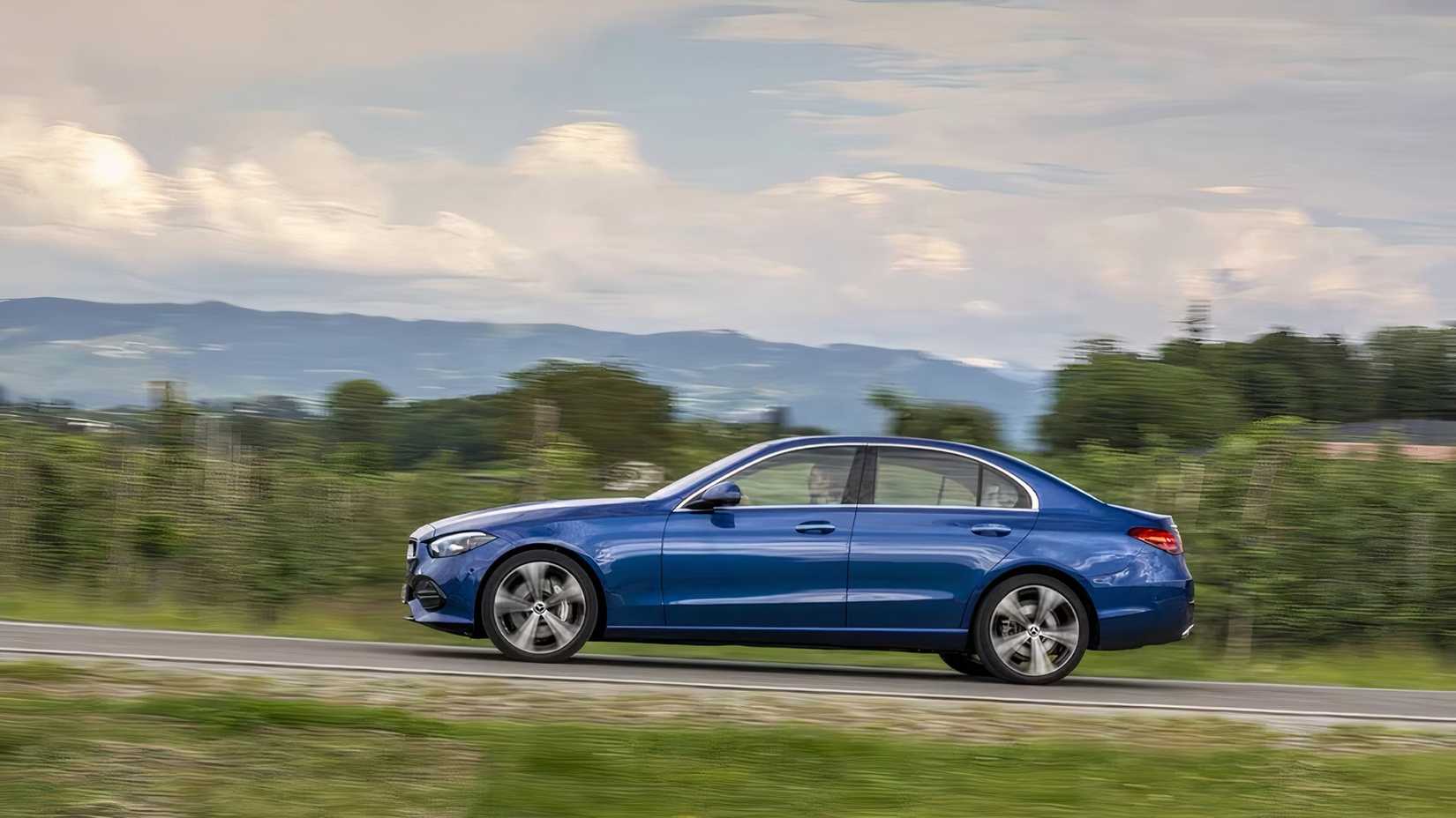 2026 Mercedes-Benz C-Class in blue driving on road