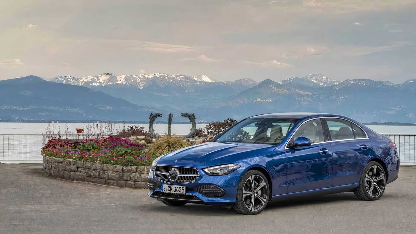 2026 Mercedes-Benz C-Class sedan in blue parked by lake