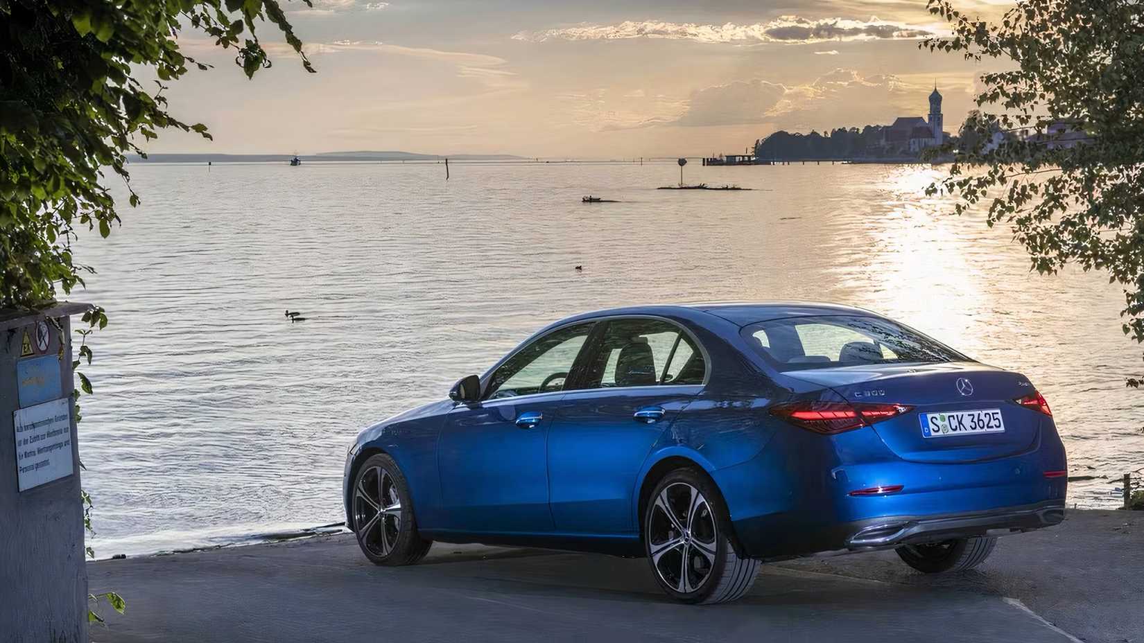 2026 Mercedes-Benz C-Class in blue parked by lake