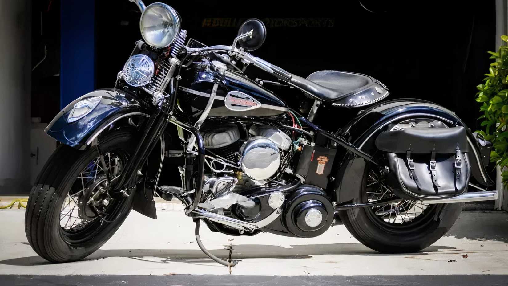 1946 Harley-Davidson WL in black parked outside