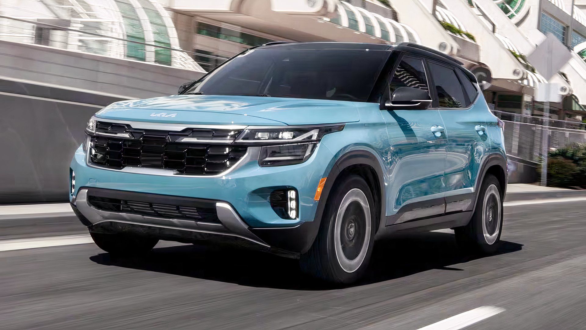 2026 Kia Seltos in blue being driven on road