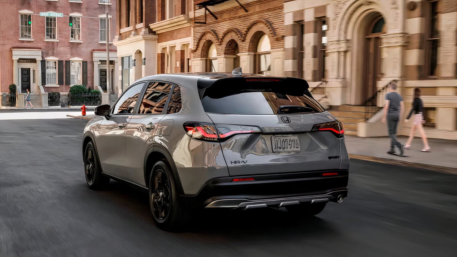 2025 Honda HR-V in silver being driven on road