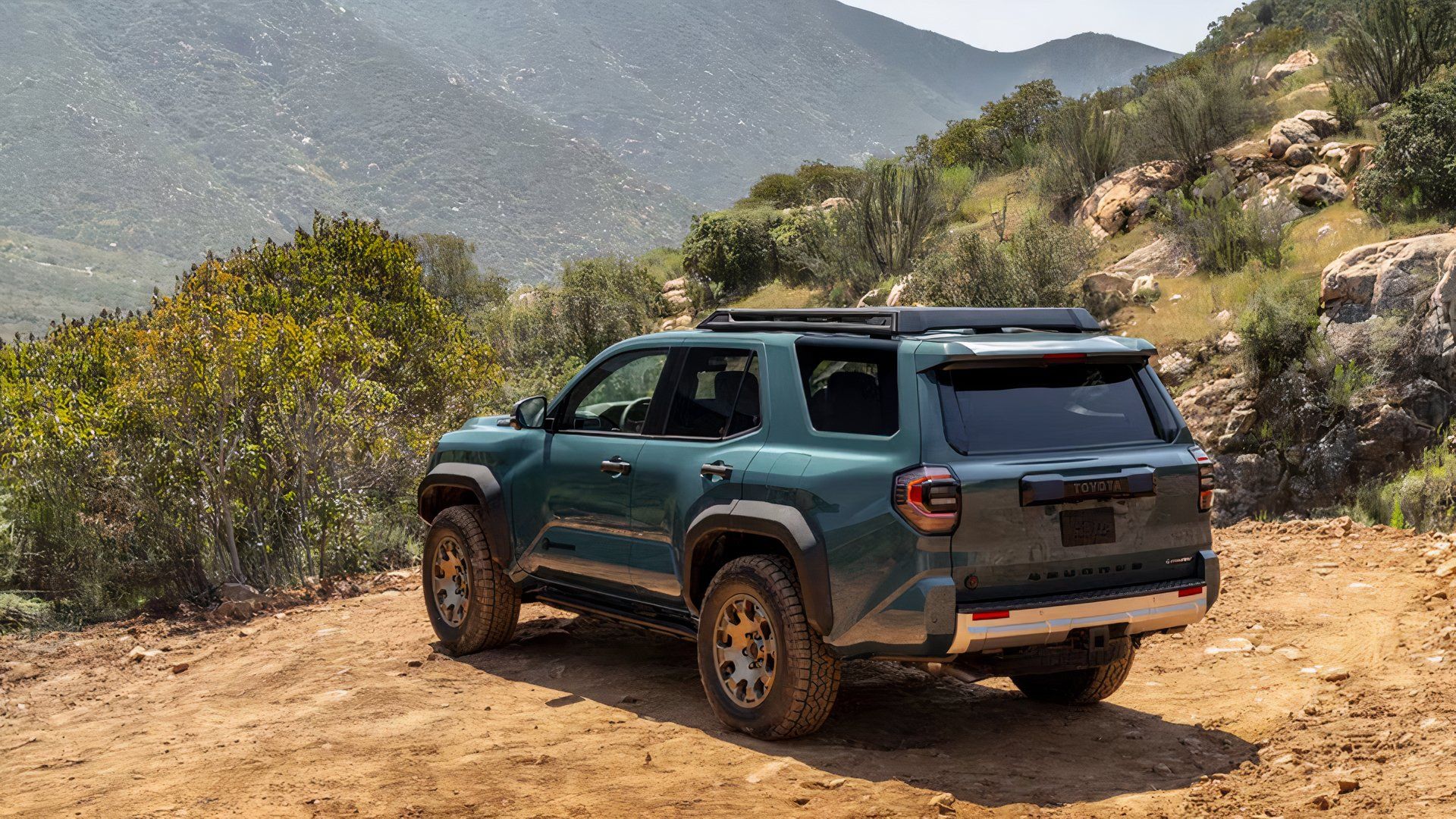 2025 Toyota 4Runner in blue parked off-road