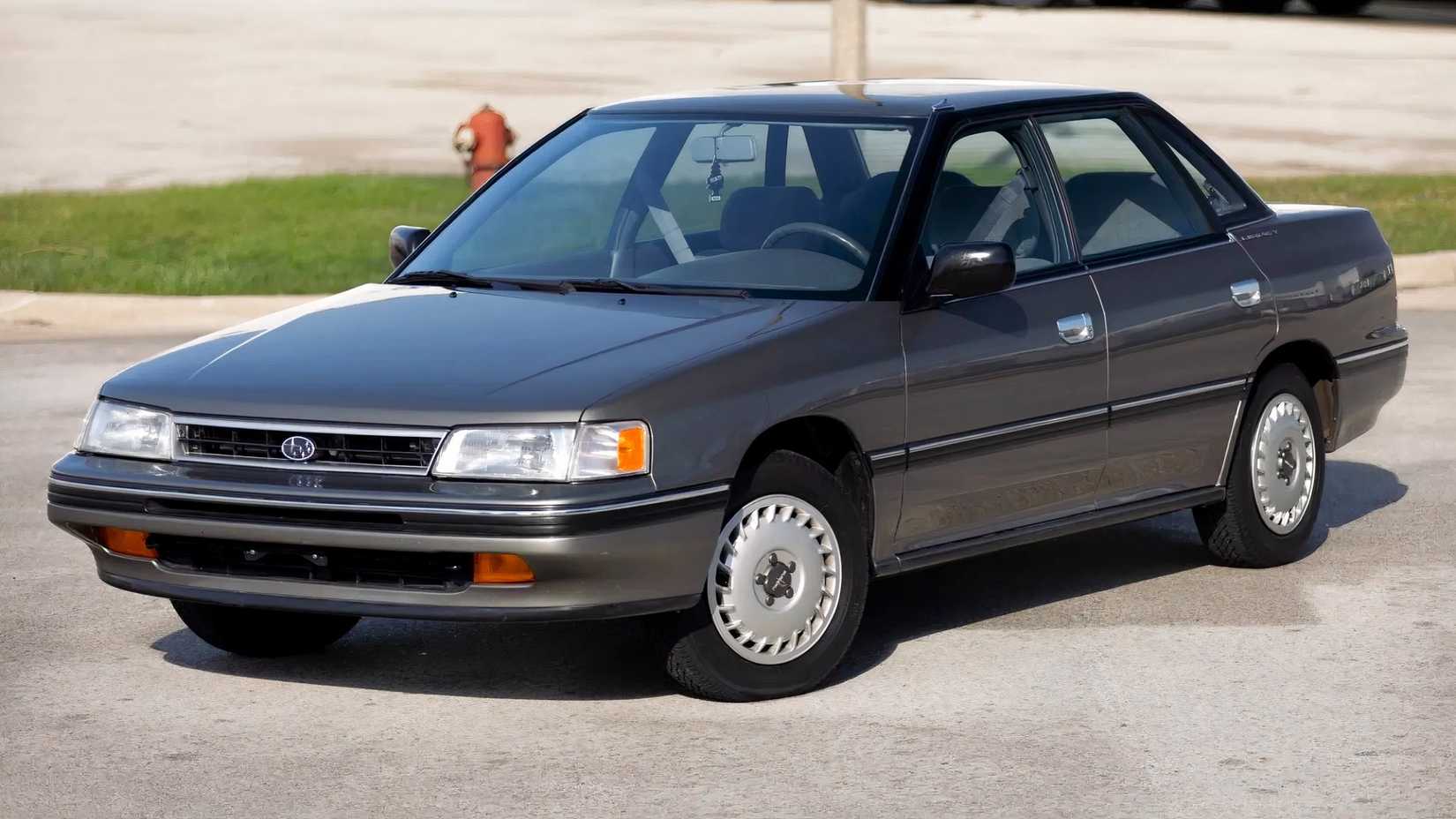 1990 Subaru Legacy L in gray parked
