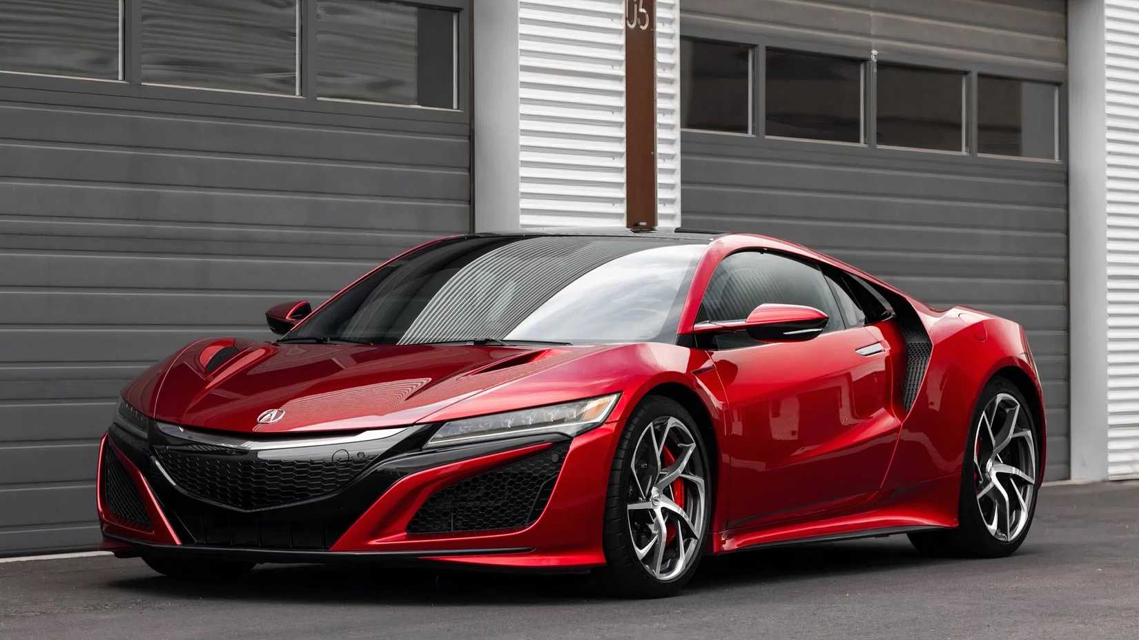 2017 Acura NSX em vermelho estacionado do lado de fora