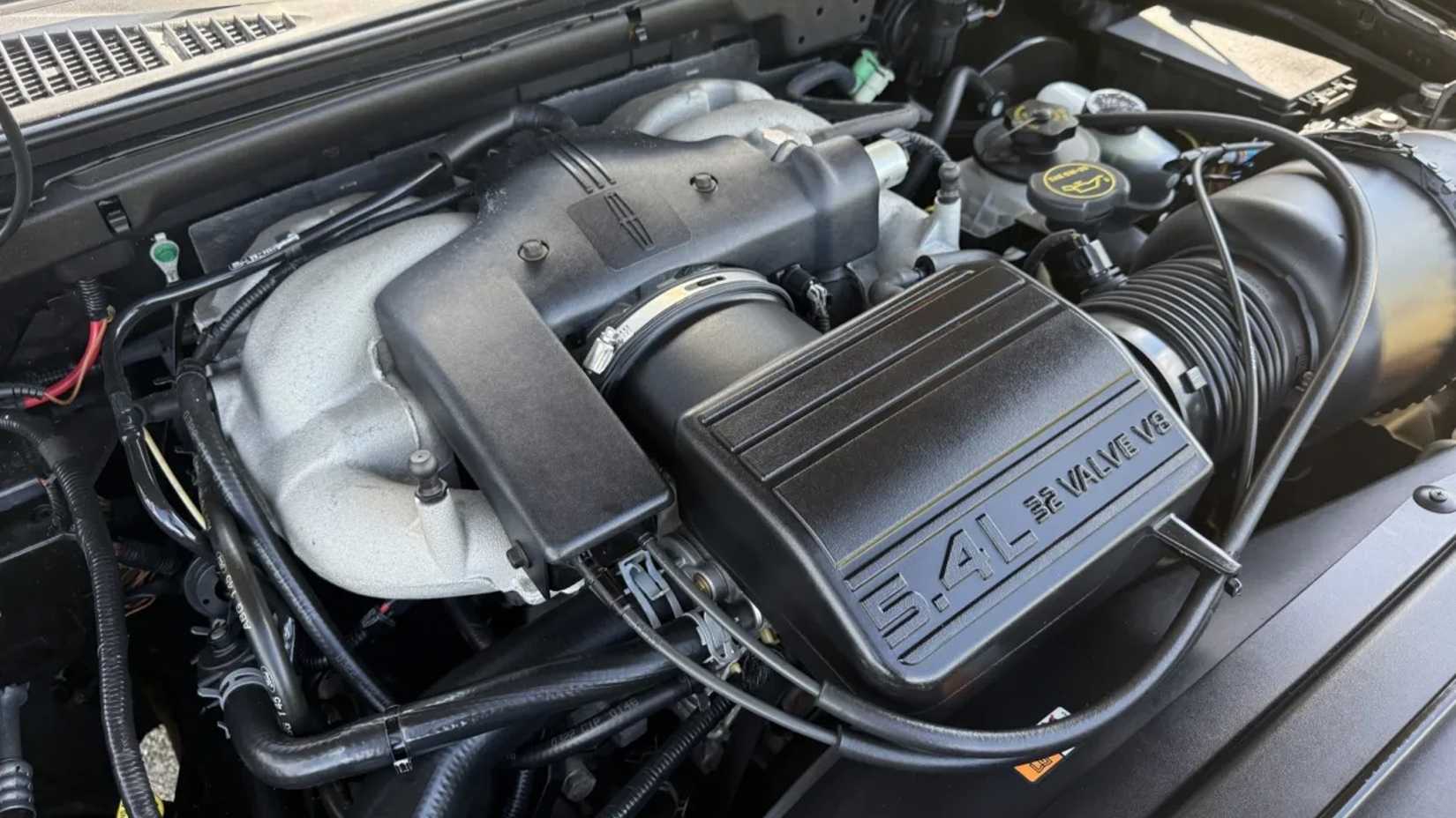 The engine bay of the 2002 Lincoln Blackwood