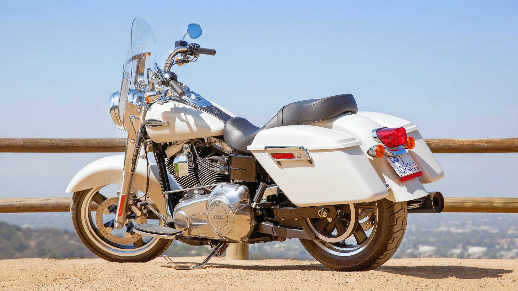 2014 Harley-Davidson Switchback parked on an overlook, static rear quarter shot
