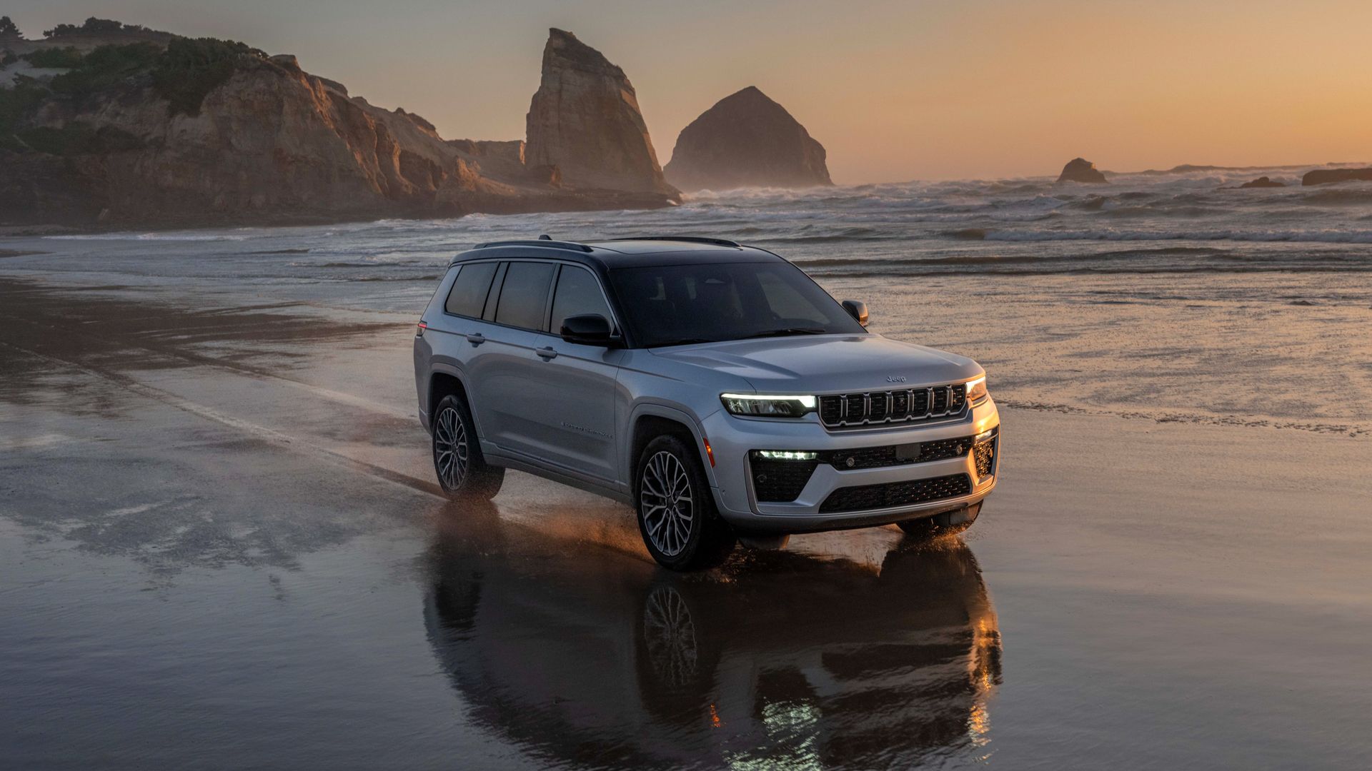 2026 Jeep Grand Cherokee being driven on the beach
