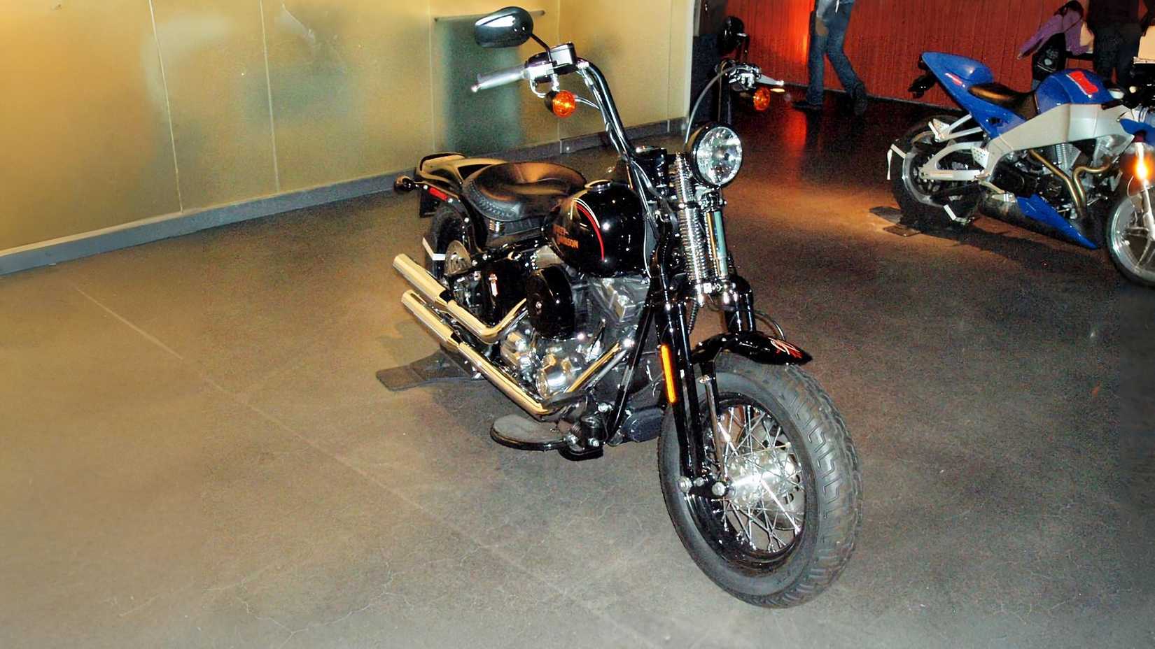 Harley-Davidson Cross Bones parked in a museum, front quarter shot
