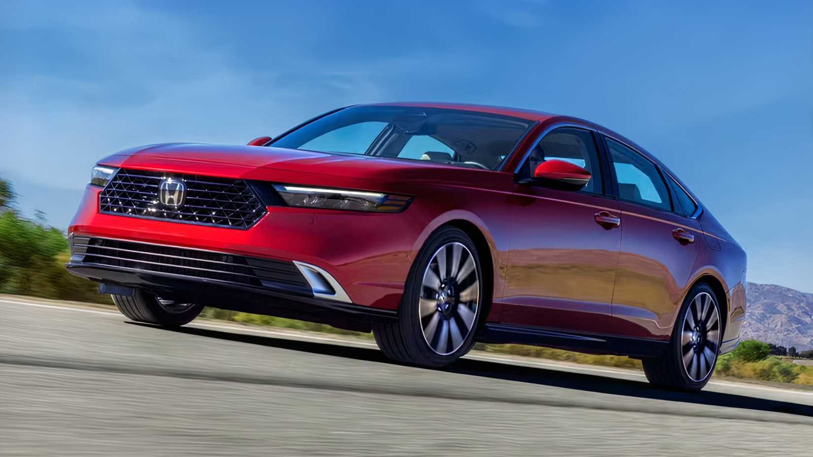 2025 Honda Accord in red being driven on road