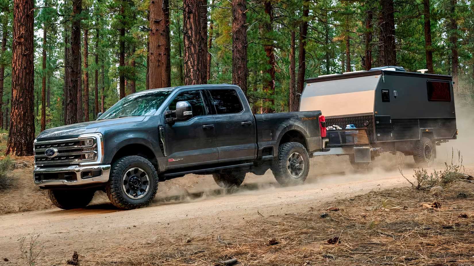 2025 Ford F-250 Super Duty in black towing a trailer