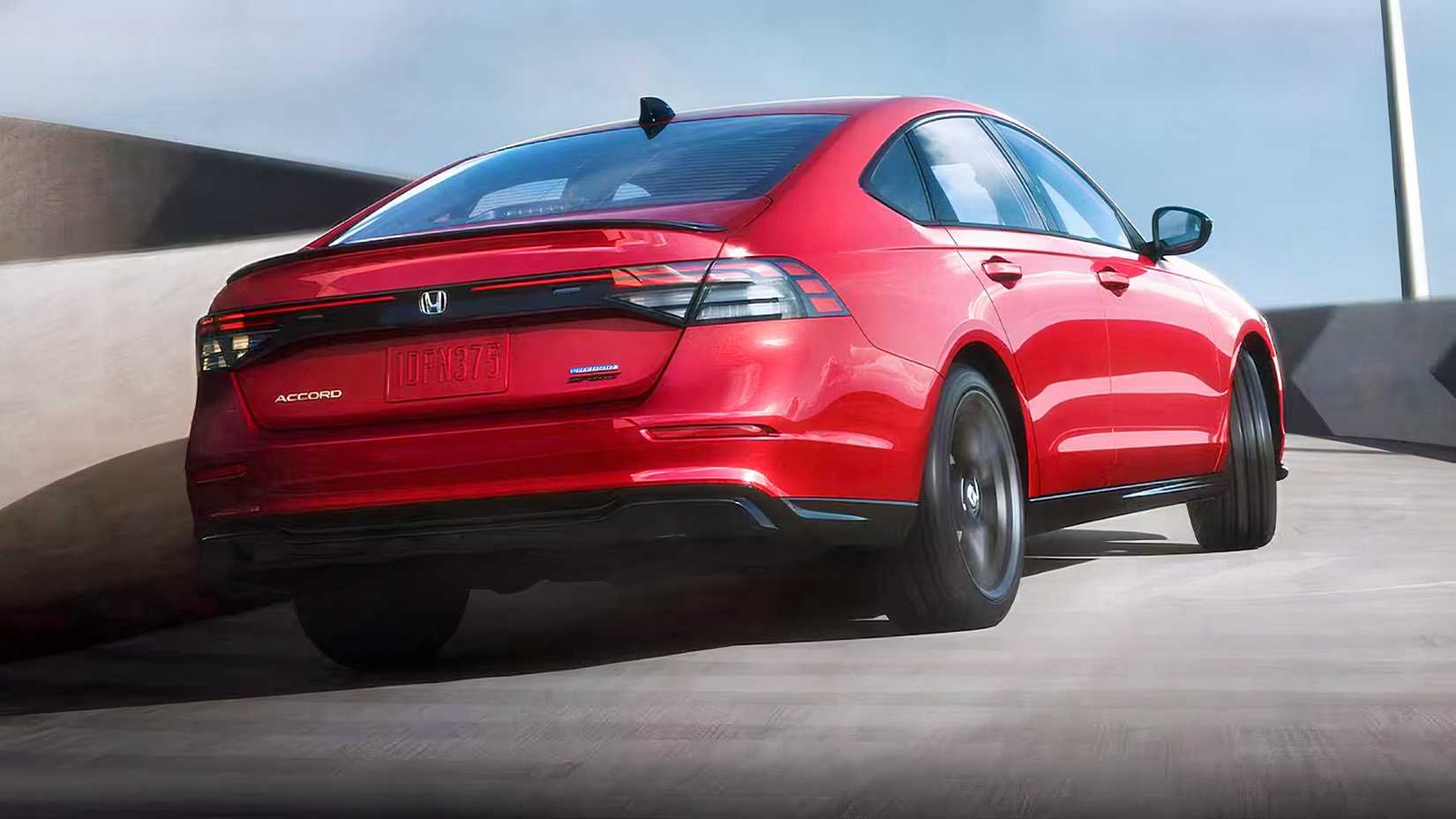 2025 Honda Accord Sport-L Hybrid in red parked