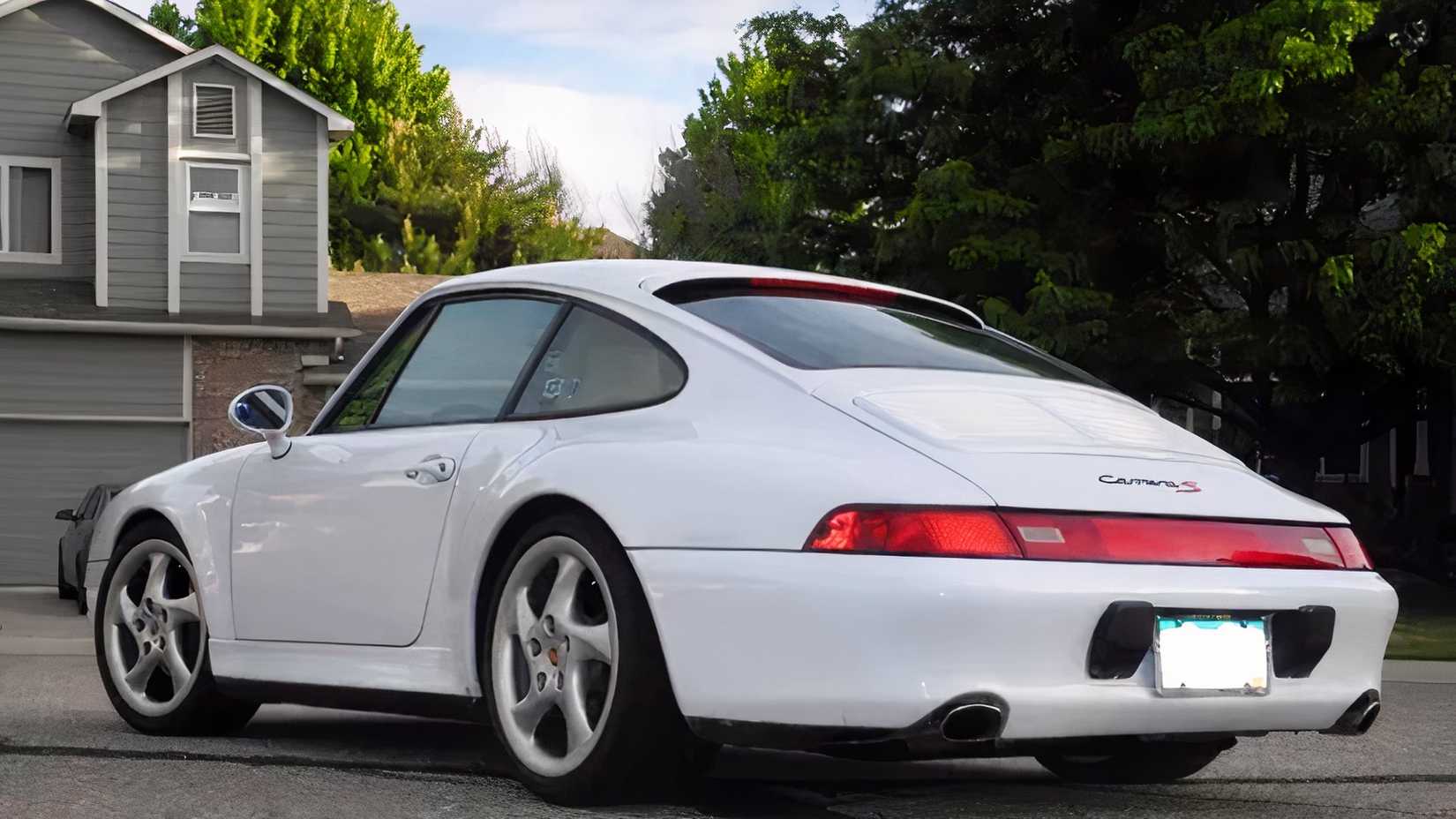 1998 Porsche 911 Carrera S in white parked