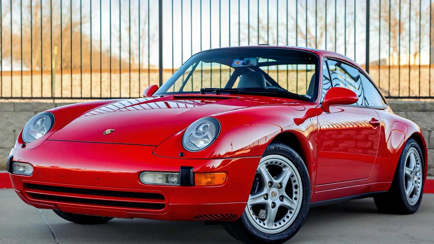 1996 Porsche 911 Targa in red parked