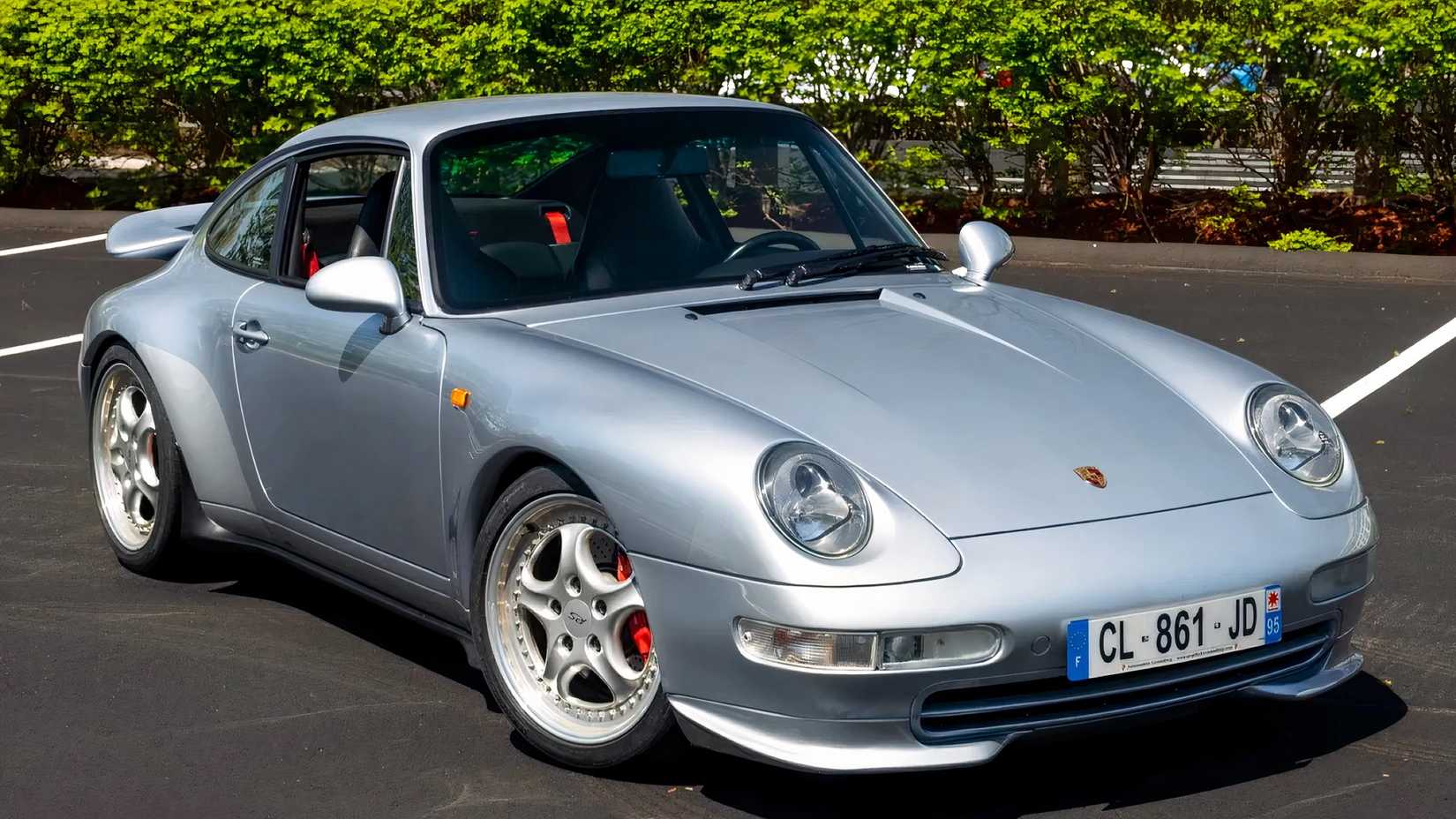1995 Porsche 911 Carrera RS in silver parked