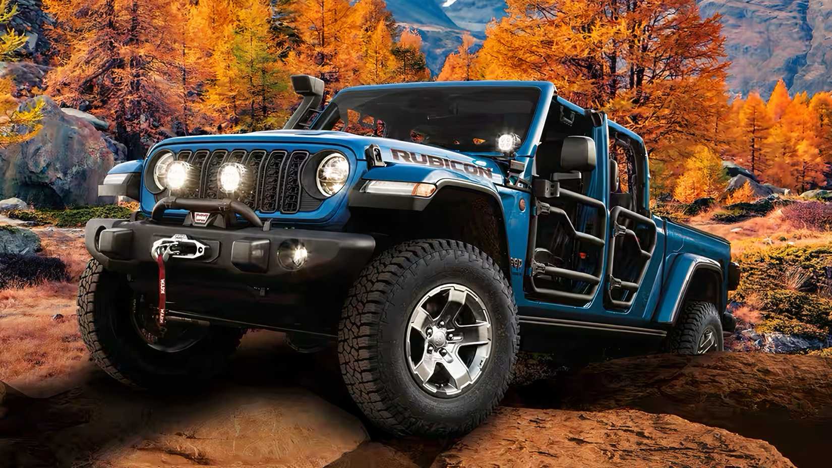 2026 Jeep Gladiator Rubicon in blue traversing rocks