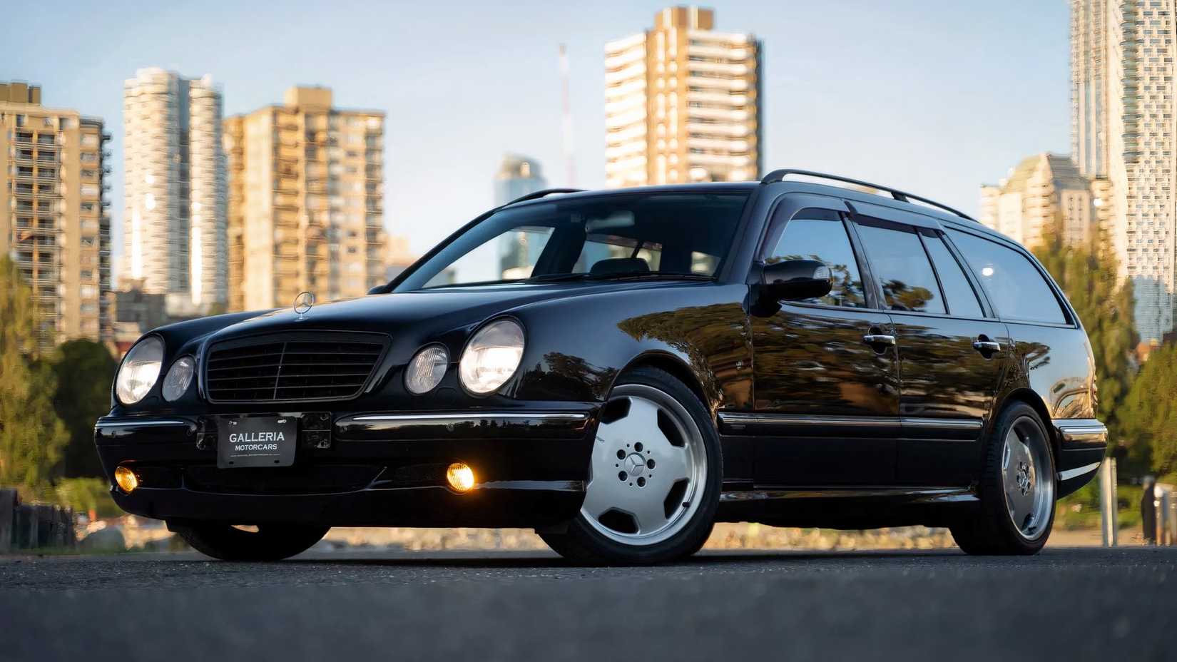 2002 Mercedes-Benz E55 AMG Wagon in black parked