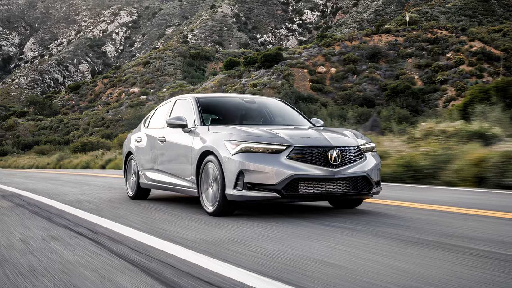 2025 Acura Integra in silver being driven on road